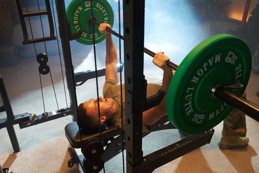 Person performing barbell workout using bench press in home gym.