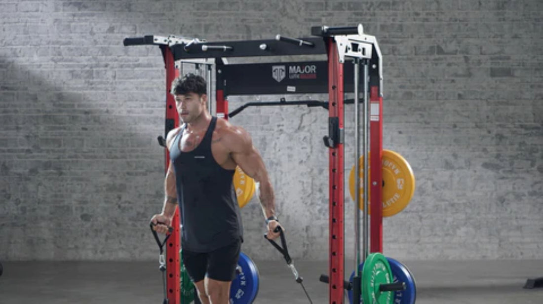 Man performing cable crossover exercise using a power rack in a gym.