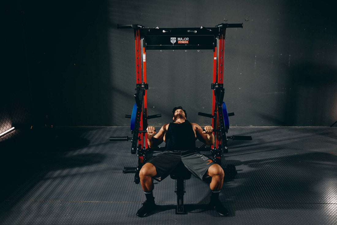 Man performing a bench press exercise with a power rack in a home gym.