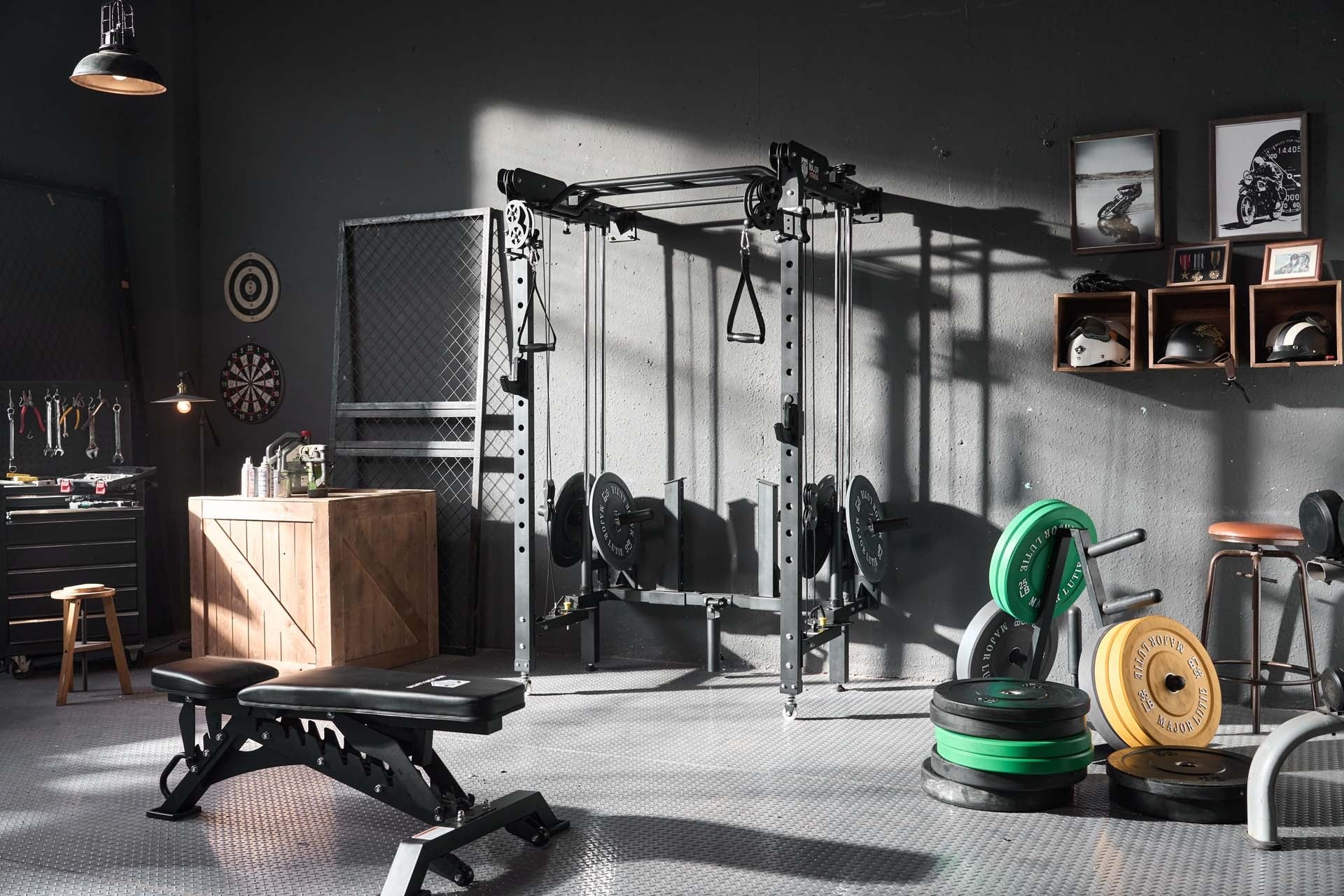 Home gym setup featuring a power rack, adjustable bench, and various weight plates.