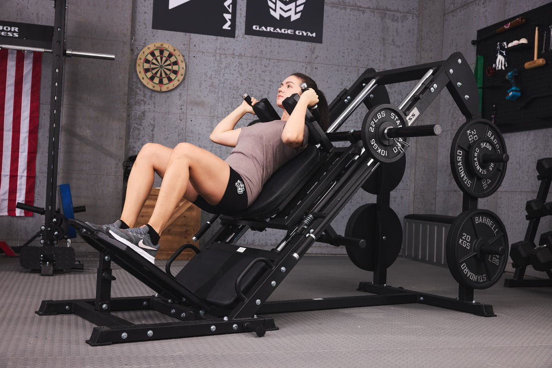 Female performing leg press exercise in a home gym.