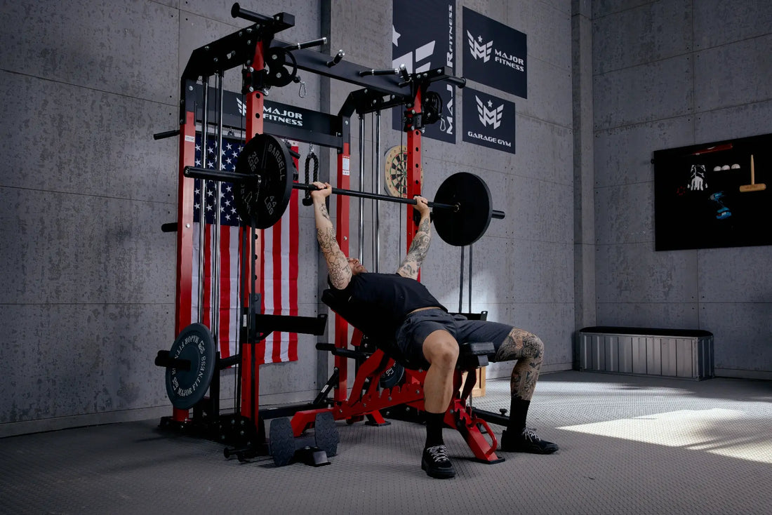 Man engaging in strength training with a Smith machine and incline bench in a home gym.