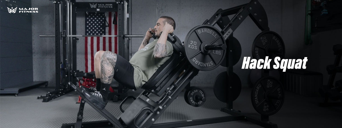 Man using hack squat machine to hack squat at home gym